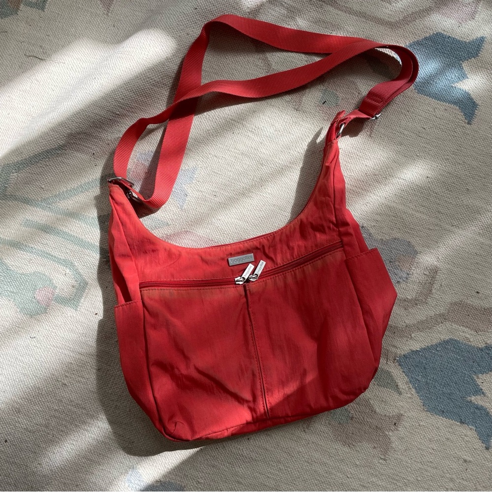 Baggalini Crossbody Sling Bag in Grapefruit